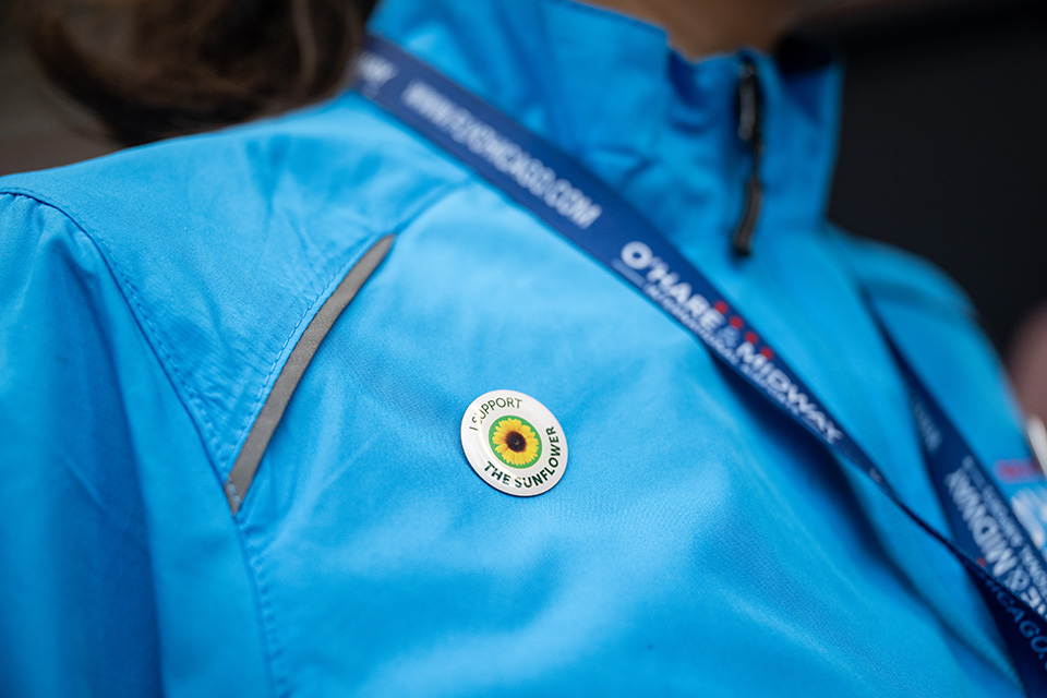 Sunflower pin on shirt