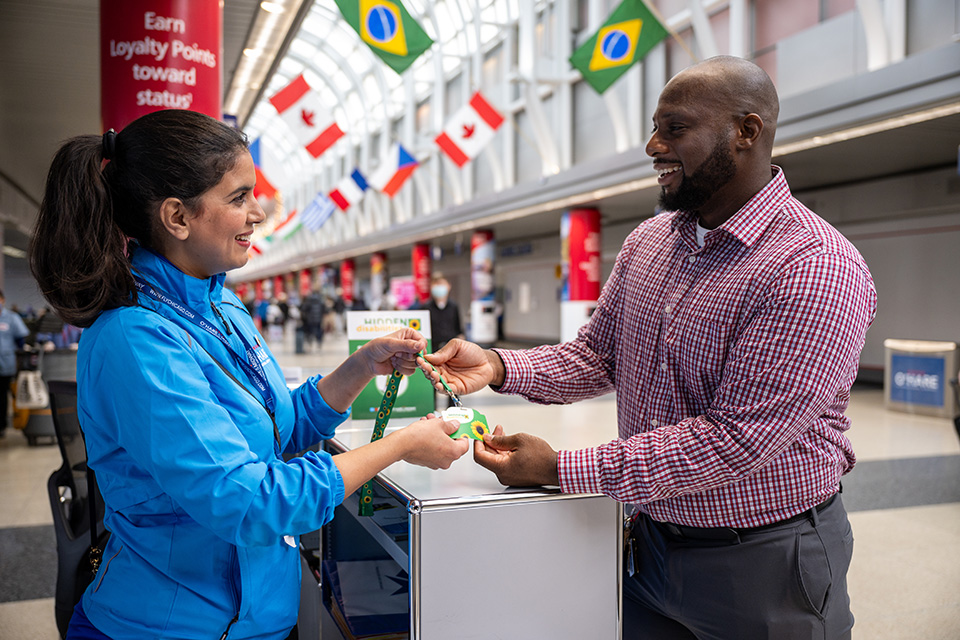 Passenger at Airport Information Desk